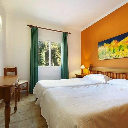 Pinos Altos Apartments Cala de Sant Vicenc Buitenkant foto