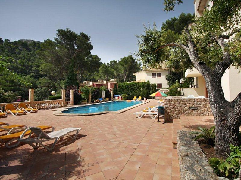 Pinos Altos Apartments Cala de Sant Vicenc Buitenkant foto